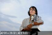 На Ли - poses with her Roland Garros Trophy at Pont de Bir Hakeim in Paris, France - June 4, 2011 (12xHQ) Ce73b3b06fa806551a6234ffec474890